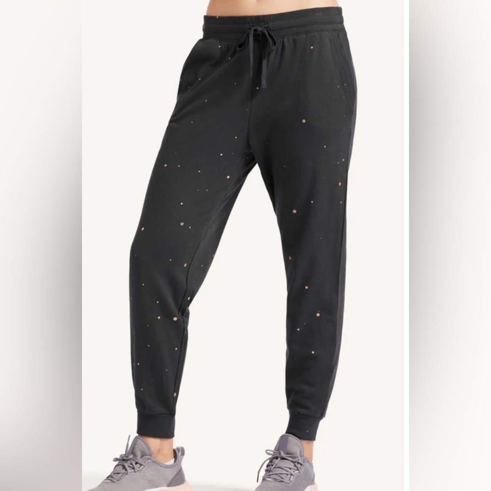 Peloton Apparel Stylish Black Joggers with Gold Paint splatter Accents size XS